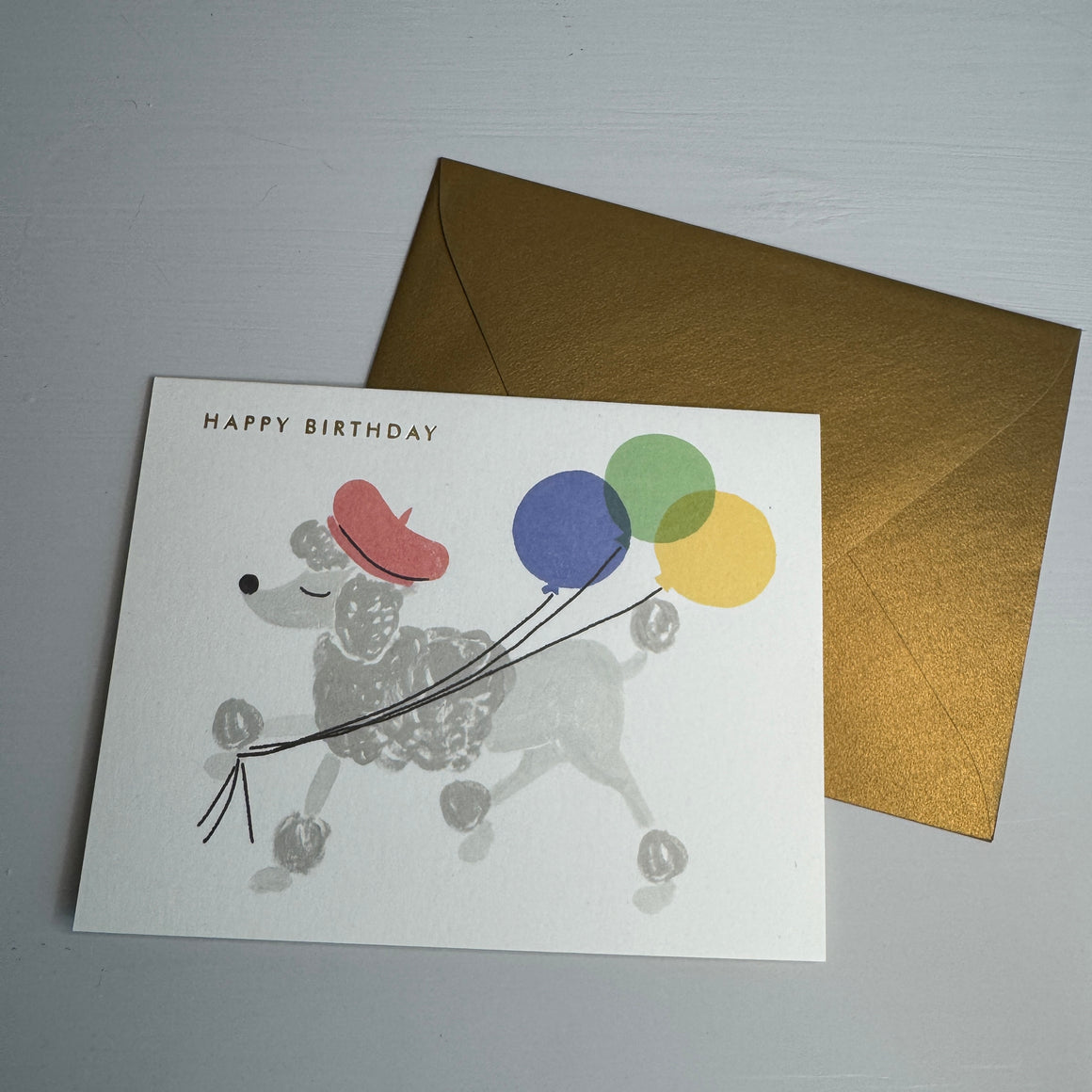 Kortti kuorella, puudeli