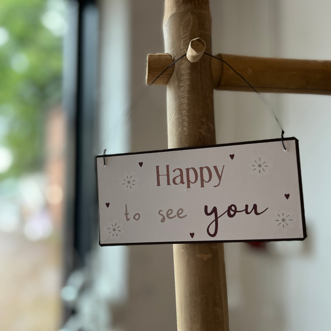 ”Happy to se you” -kyltti